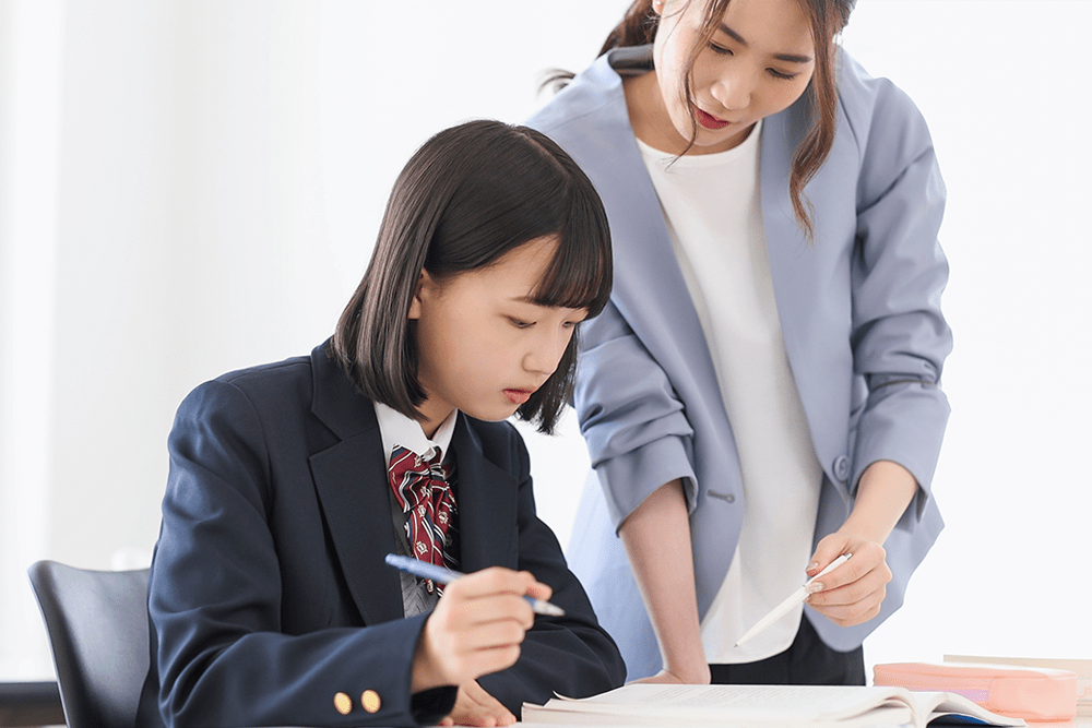 面談する高校生 学校教育におけるコーチングとは
